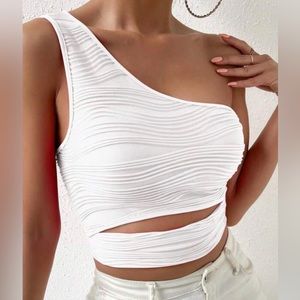 One shoulder cut out crop top.